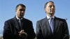 Republican gubernatorial candidate Rob Astorino (r) and Congressman Michael Grimm greet people as they exit a grocery store in the Staten Island borough of New York, Nov. 3, 2014. 