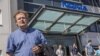Union steward Jarmo Talvitie talks to media as Nokia employees leave a personnel briefing in Tampere, Finland, June 14, 2012. 