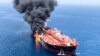 An oil tanker is seen after it was attacked at the Gulf of Oman, June 13, 2019.
