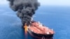 An oil tanker is seen after it was attacked at the Gulf of Oman, June 13, 2019.