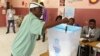 A voter casts his vote in elections in Luanda, Angola, Aug. 23, 2017. 