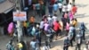 Bangladeshi security personnel charge to disperse garment workers protesting in Gazipur on Nov. 9, 2023, after the Minimum Wage Board authority declared the minimum wage of 12,500 taka ($113) for garment workers.