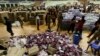 Volunteers sort relief material to be distributed to flood victims in Chennai, India, Dec. 6, 2015. The worst flooding in a century in Tamil Nadu has left scores of people dead since November. 