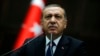 FILE - Turkish Prime Minister Recep Tayyip Erdogan addresses members of parliament from his ruling AK party at the parliament in Ankara, June 3, 2014.