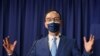 Eric Chu speaks to members of the media after winning the chairmanship of Taiwan's main opposition Kuomintang Party (KMT), in Taipei, Sept. 25, 2021.