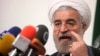 Hasan Rowhani speaks during a campaign rally in Tehran, May 30, 2013.