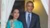 FILE - President Barack Obama, right, walks out with Myanmar's Aung San Suu Kyi at her home before the start of their joint news conference in Yangon, Myanmar. 