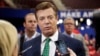 Trump Campaign Chairman Paul Manafort talks to reporters on the floor of the Republican National Convention at Quicken Loans Arena, July 17, 2016, in Cleveland.