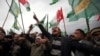 Supporters of different opposition political parties shout slogans for the empowerment of the Election Commission of Pakistan during a rally in Islamabad February 4, 2013. REUTERS/Mian Khursheed (PAKISTAN - Tags: CIVIL UNREST POLITICS) - RTR3DCBL